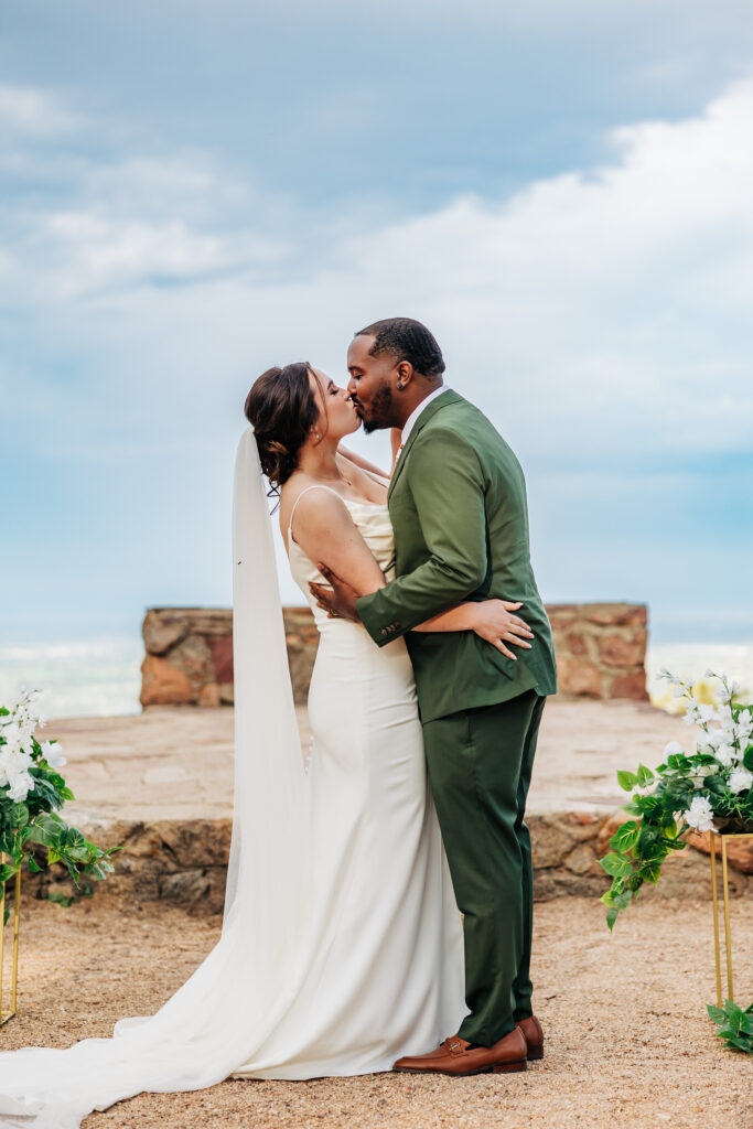 Boulder Wedding Photographer captures couple kissing as newly married couple