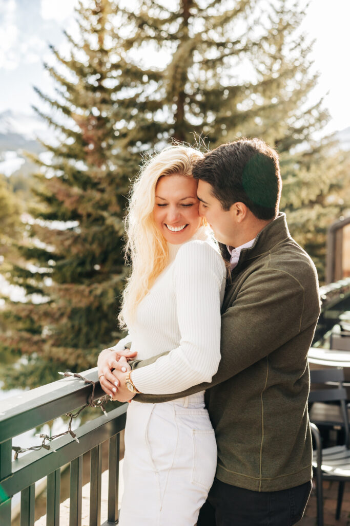 Denver wedding photographer captures man hugging woman from behind