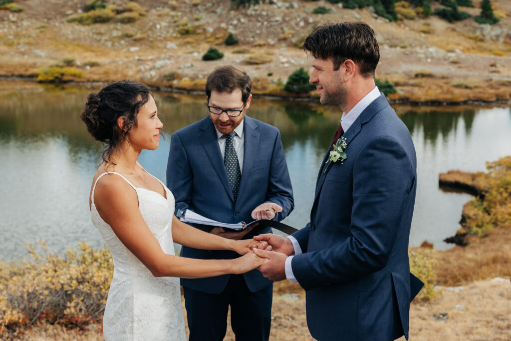 Colorado Elopement Photographer captures bride and groom reading vows