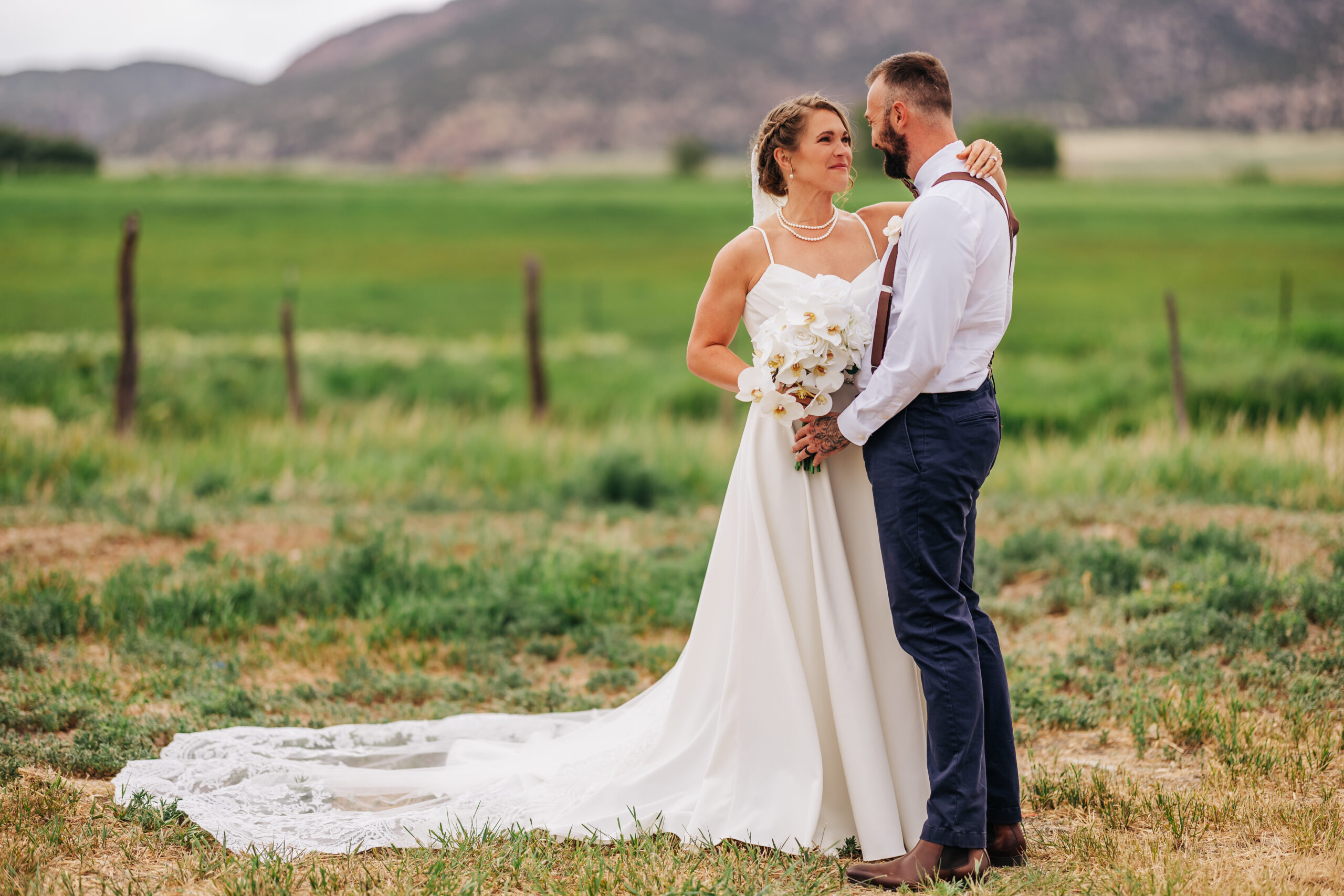 Colorado Elopement Photographer captures bride and groom hugging