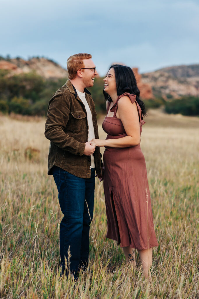 Colorado Elopement Photographer captures newly engaged couple laughing