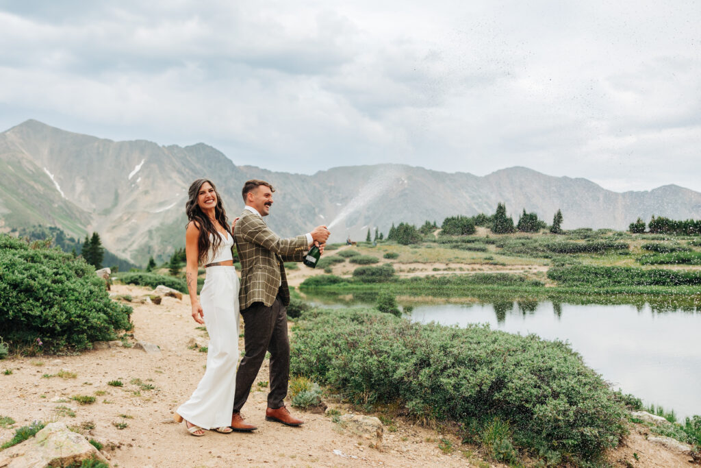 Colorado Elopement Photographer captures bride and groom celebrating recent marriage