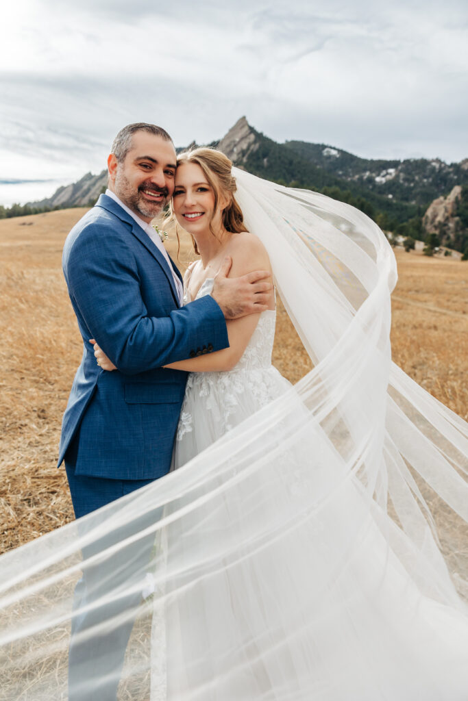 Denver Elopement Photographer captures bride's veil blowing in the wind