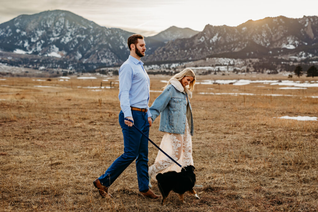 Denver Wedding Photographer captures man walking puppy with fiance