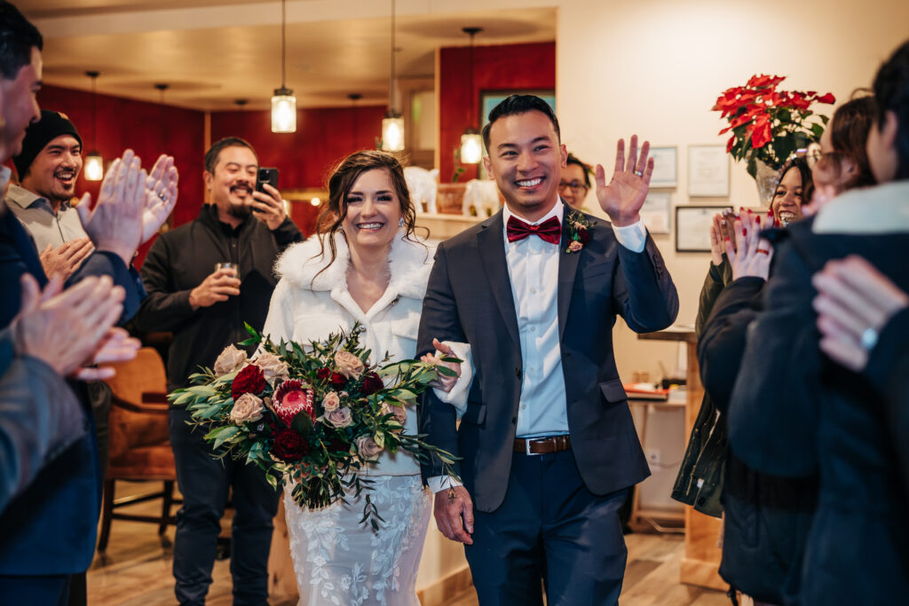 Colorado Wedding Photographer captures bride and groom saying bye