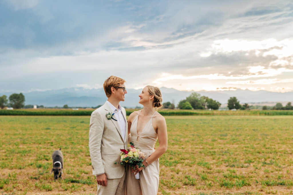 Denver Elopement Photographer captures bride and groom embracing and laughing together