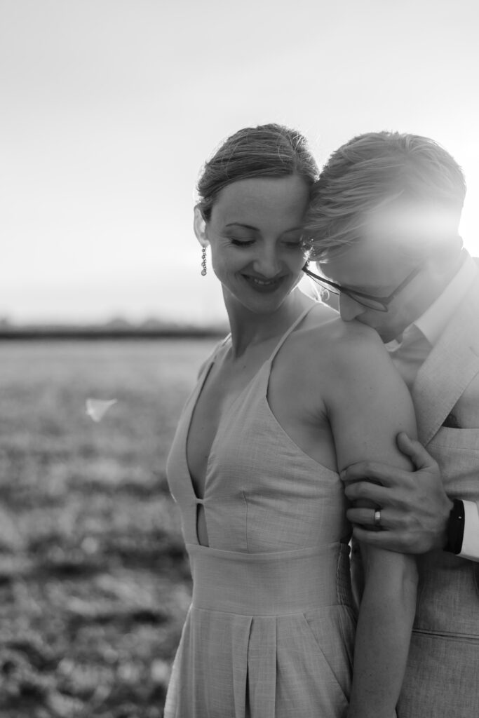 Denver Elopement Photographer captures groom kissing bride's shoulder