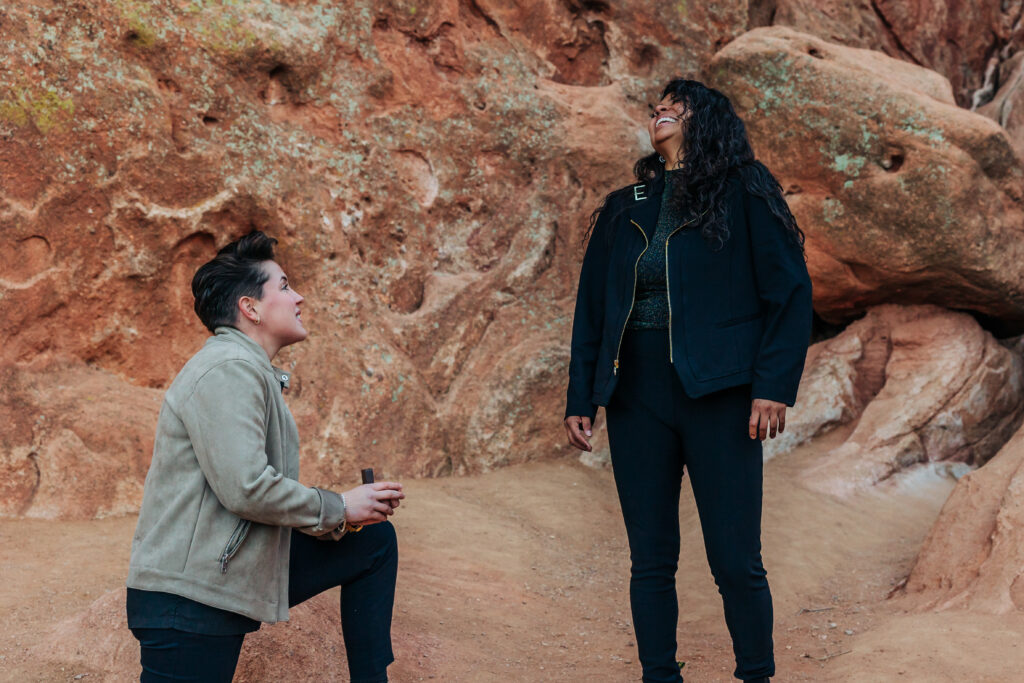 Denver Wedding Photographer captures woman proposing to girlfriend during surprise proposal