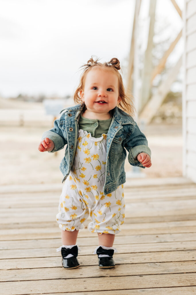 Denver Family Photographers capture toddler walking during outdoor fall family photos