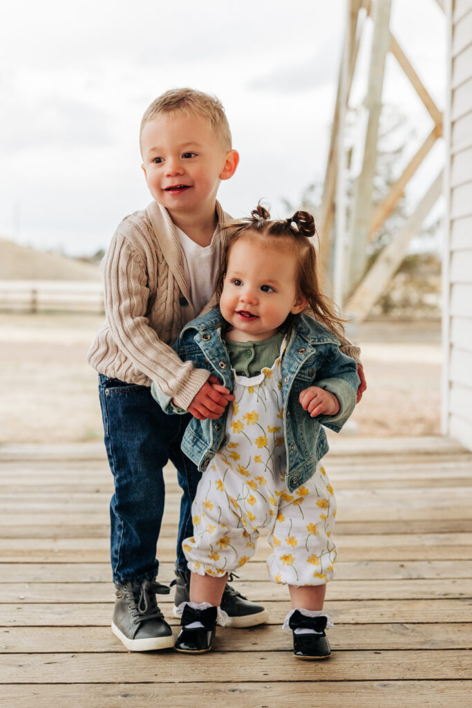 Denver Family Photographer captures young siblings having fun together