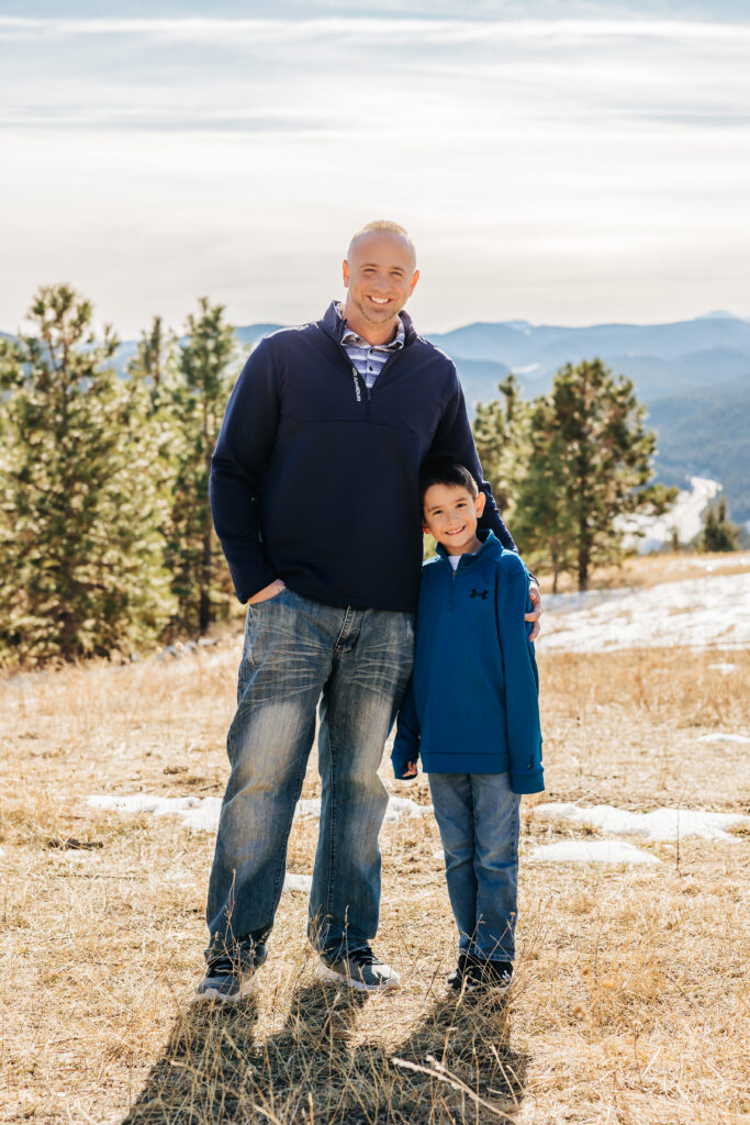 Denver Family Photographer captures father standing with son outdoors