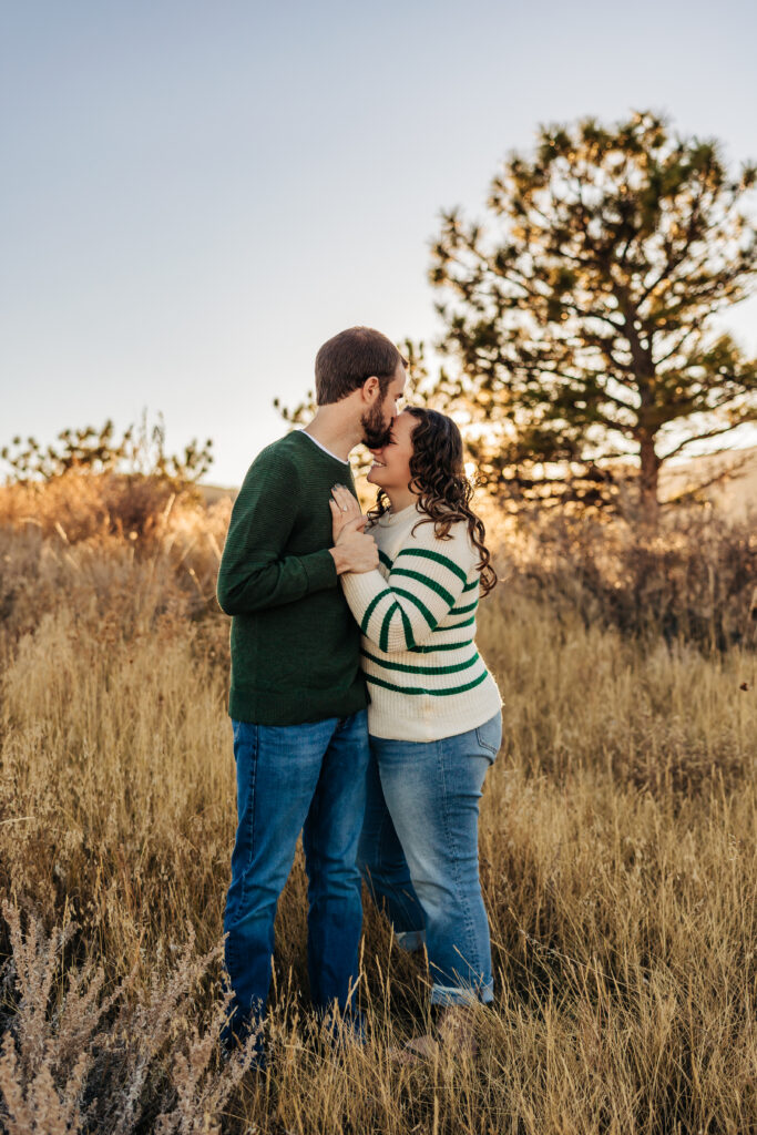 Denver Family Photographers capture man and woman hugging during outdoor photos