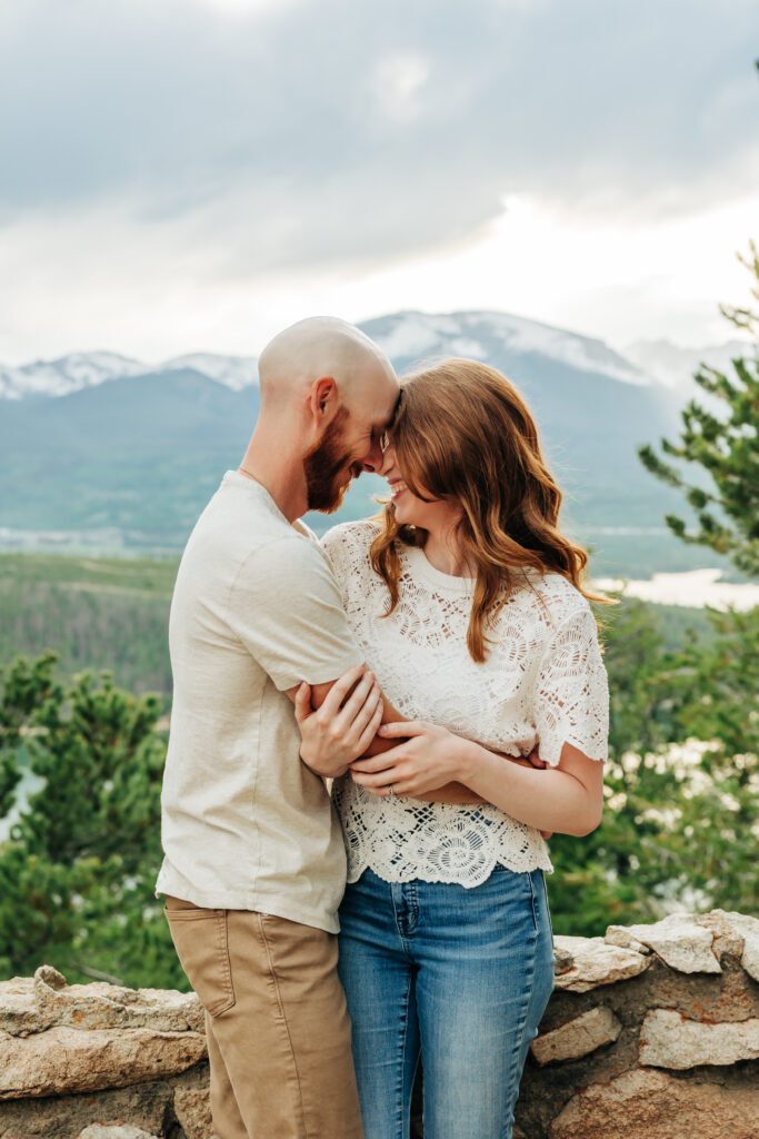 Denver Engagement Photographer captures man and woman touching foreheads 