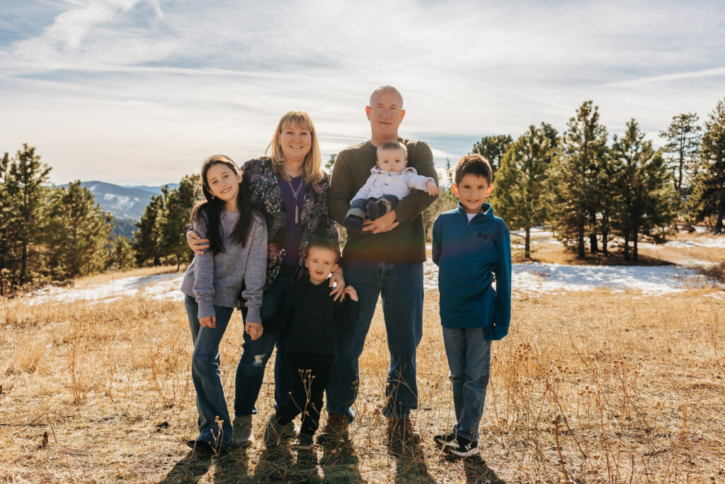 Denver Family Photographer captures grandparents standing with grandchildren