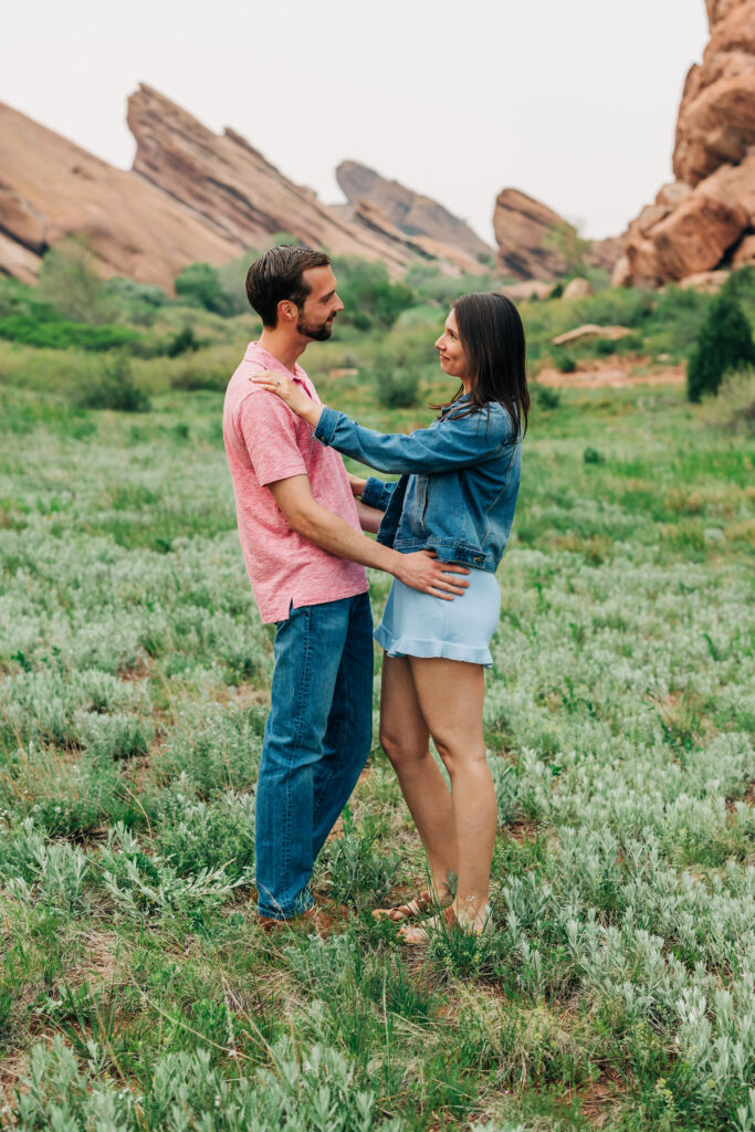 Denver Wedding Photographer captures woman with hands on man's shoulders