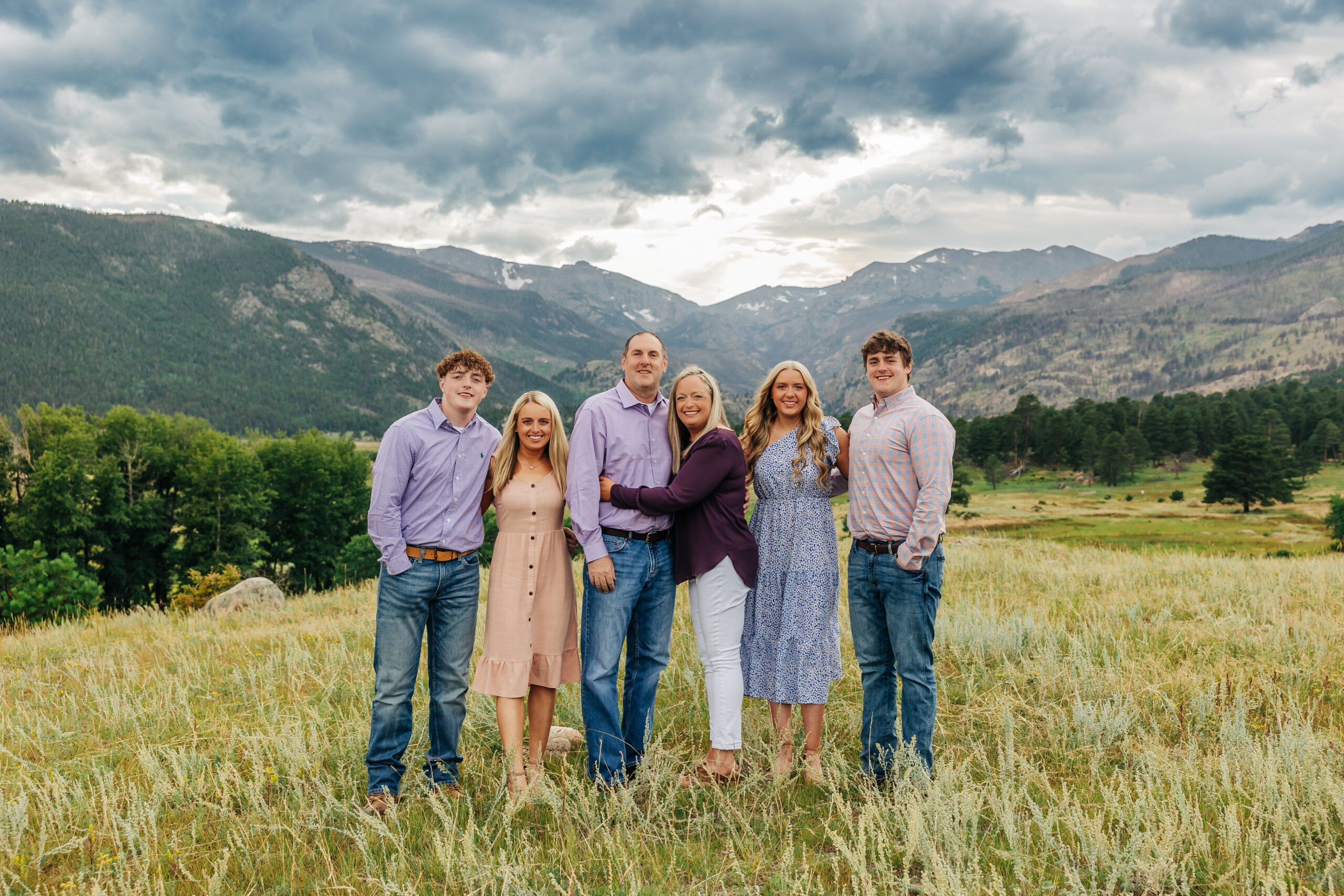 Denver Family Photographer captures family standing together during spring family photos