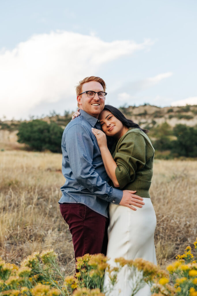 Colorado Elopement Photographer captures woman leaning against man's chest