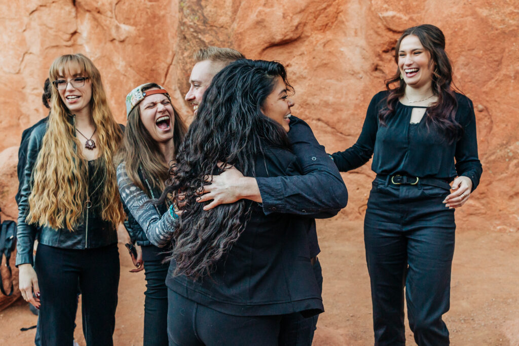 Denver Wedding Photographer captures friends celebrating with engaged couple