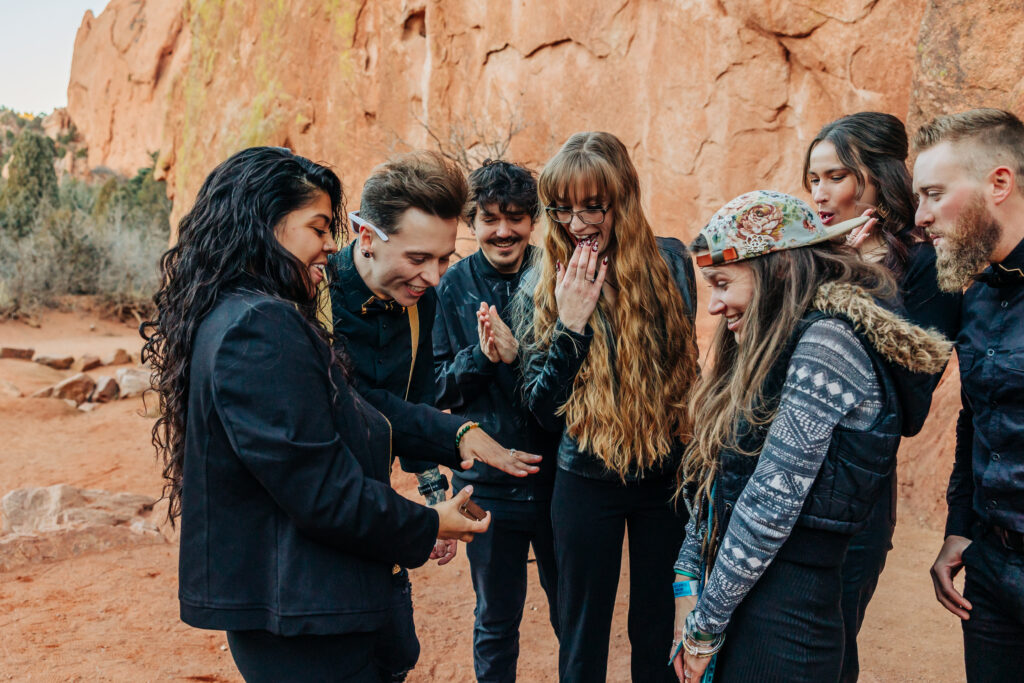 Denver Wedding Photographer captures brides showing friends engagement ring