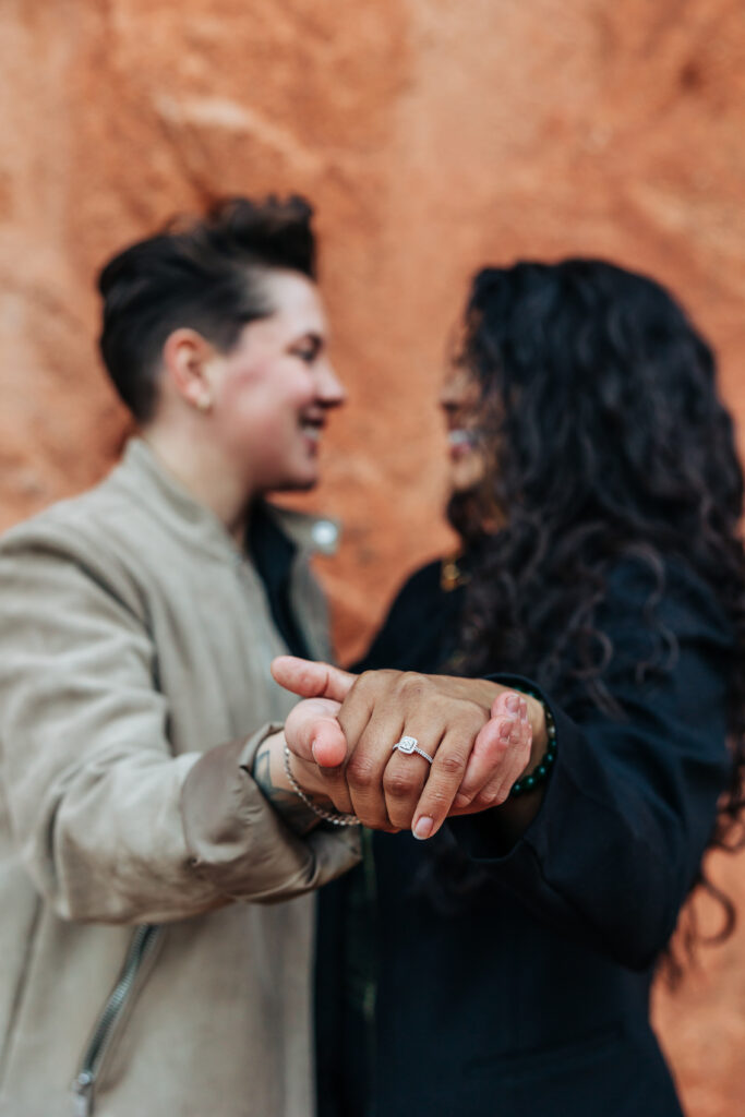 Denver Family Photographer captures couple holding hands and showing off engagement ring