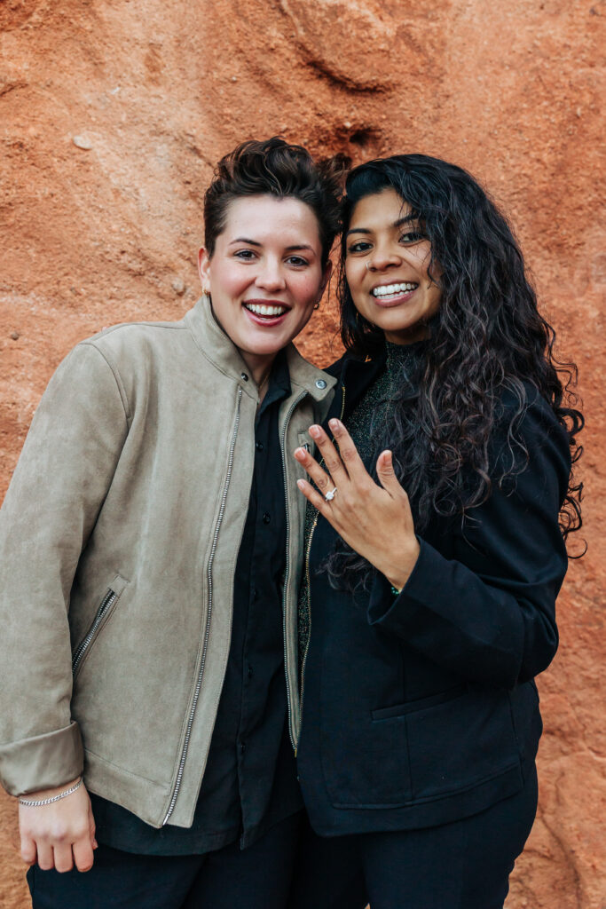 Denver Wedding Photographer captures woman showing off engagement ring