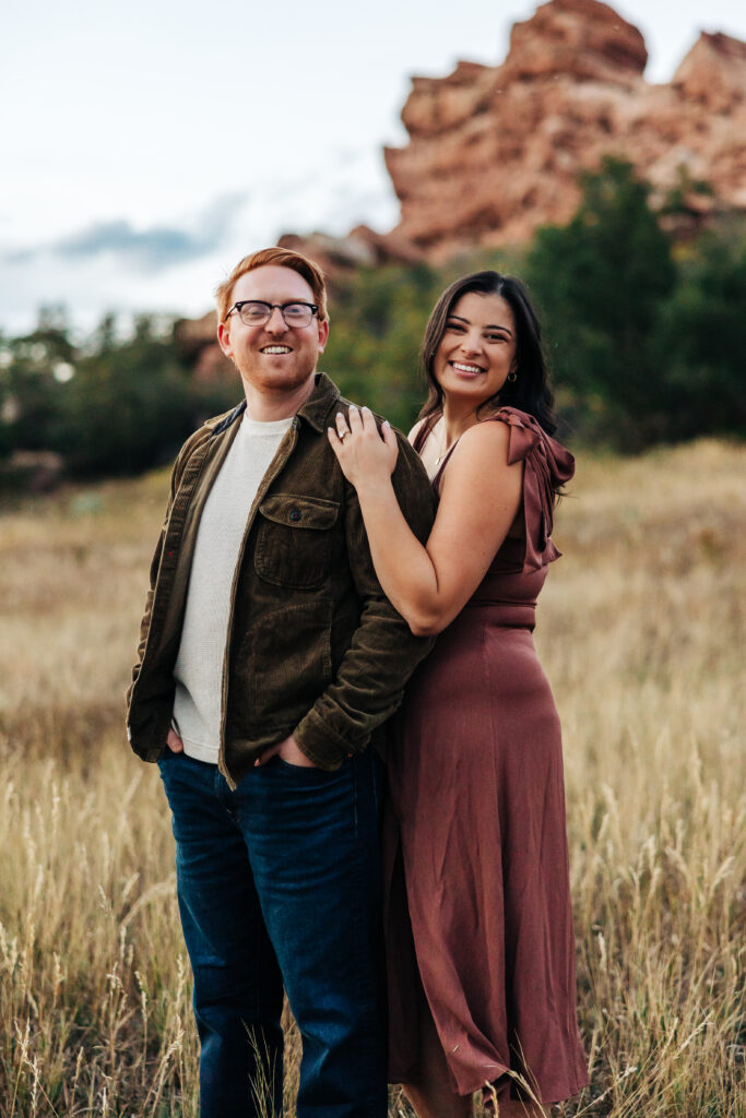 Colorado Elopement Photographer captures woman with arms on his shoulder